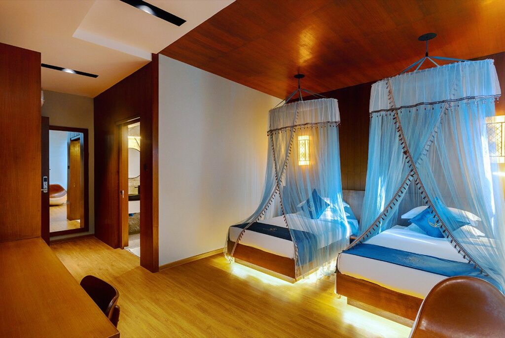 Twin beds and the room entrance