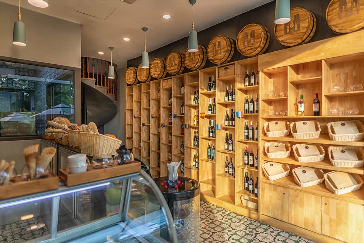 Marco’s Gourmet Shop with fresh bakes and shelves of wine